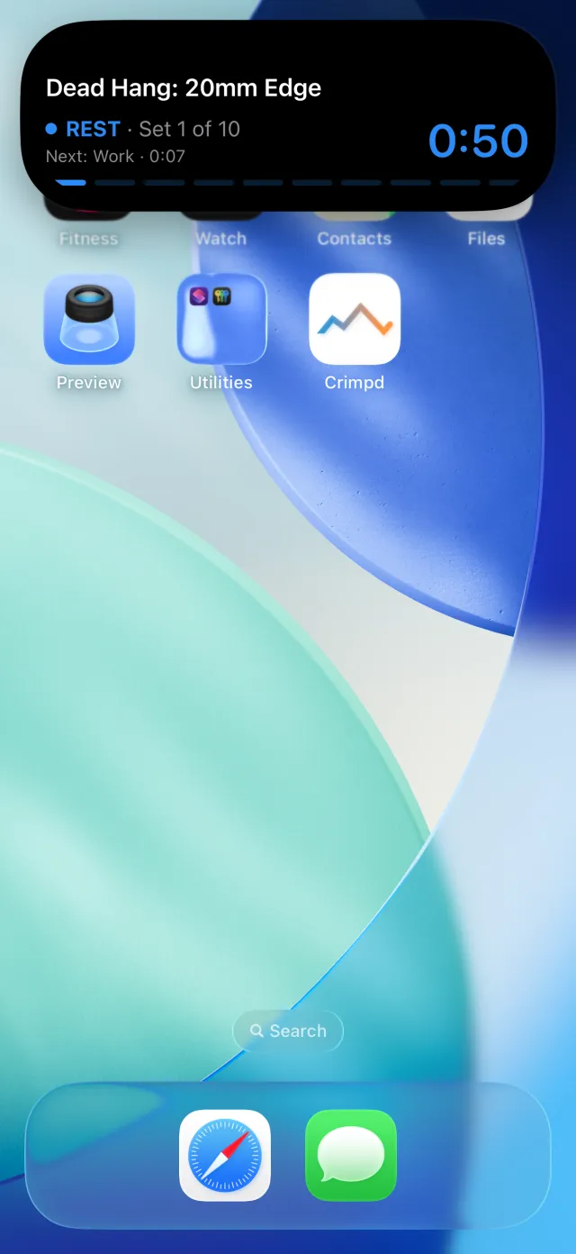 Crimpd background timer expanded in the iPhone Dynamic Island, showing 50 seconds of rest in set 1 of 10